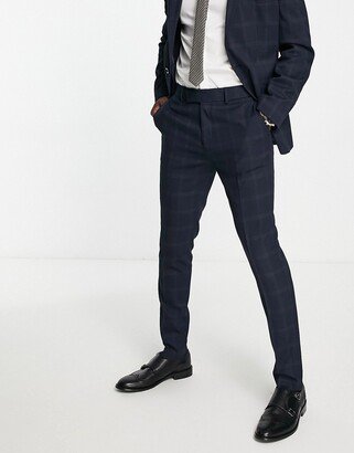 skinny suit pants in navy and dark green windowpane check