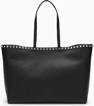 Black studded tote bag