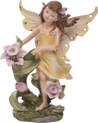 Resin 7 in. Yellow Spring Fairy with Flower Figurine