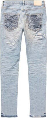 Blue Distressed Low-Rise Skinny Jeans