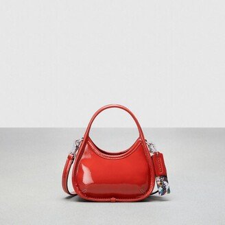 Mini Ergo Bag With Crossbody Strap In Crinkled Patent Leather