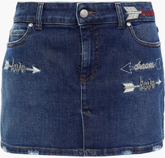 Skirt-effect embellished distressed denim shorts