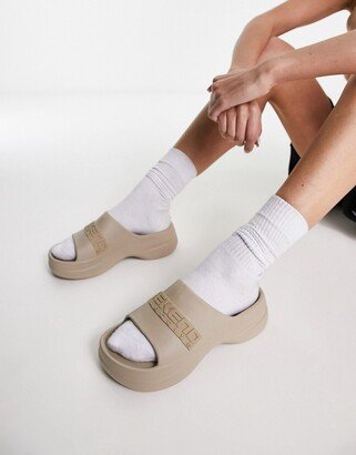 Weekend Collective platform slider in beige