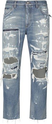 Loose blue wash denim jeans with rips