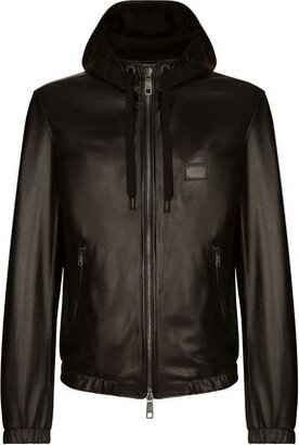 Leather jacket with hood and branded tag