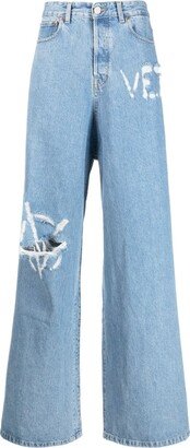 Logo-Distressed Baggy Jeans