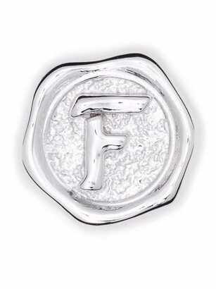 POP letter F coin