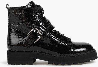 Cracked patent-leather combat boots