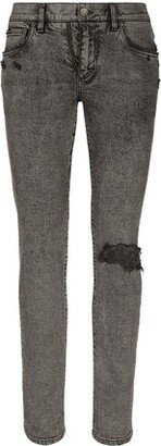 Light gray slim-fit stretch jeans with rips