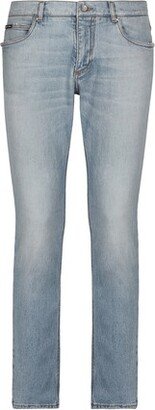 Regular fit washed stretch denim jeans with abrasions