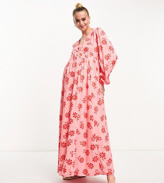 ASOS DESIGN Maternity viscose v-neck long sleeve midi dress with tie front detail in red and pink floral