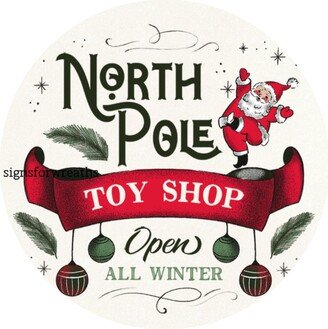 Retro Santa Christmas Sign, Metal Wreath North Pole Toy Shop Sign