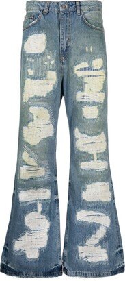 Flaneur Homme Repaired Metropole flared jeans