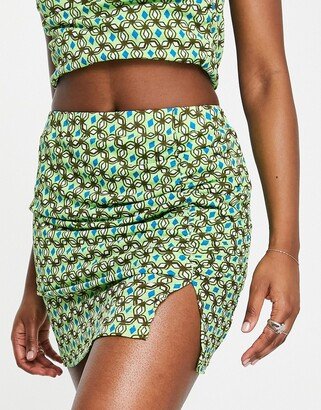 ruched side skirt in green abstract print - part of a set