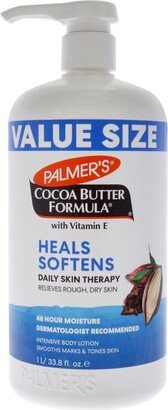 Cocoa Butter Formula With Vitamin E Lotion by for Unisex - 33.8 oz Body Lotion