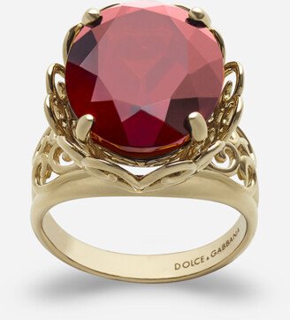 Gold ring with precious stone