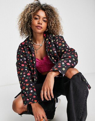 relaxed puffer jacket in multi floral print