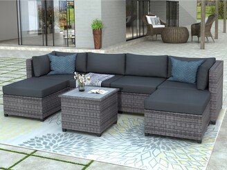7 Piece Rattan Sectional Seating Group with Cushions
