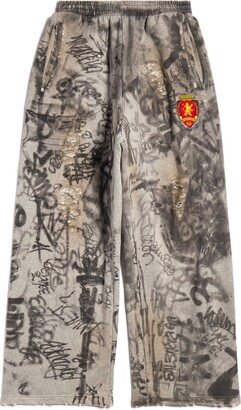 Graffiti Crest cotton track pants