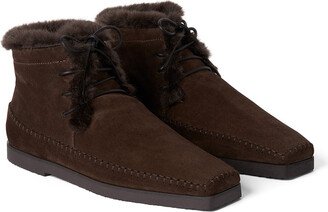 The High-Top Shearling Moccasin Boots