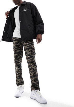 cargo tapered pants in camo print with toggles