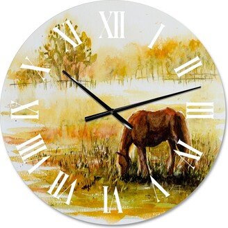 Designart 'Horse Grazing On A Meadow' Farmhouse wall clock
