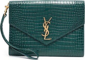 Cassandre crocodile-effect clutch bag