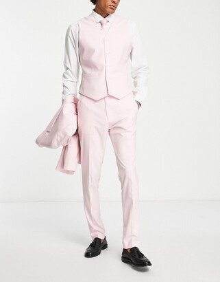 skinny suit pants in pastel pink