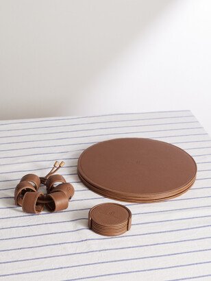 Set of Six Debossed Leather Placemats, Coasters and Napkin Rings