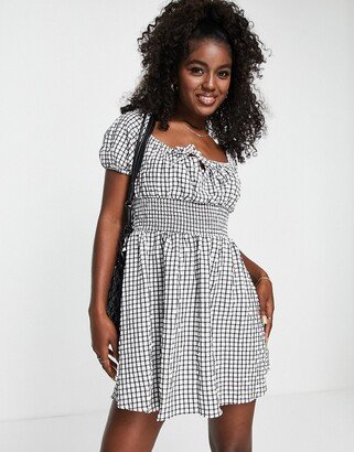 shirred mini milkmaid tea dress in gingham