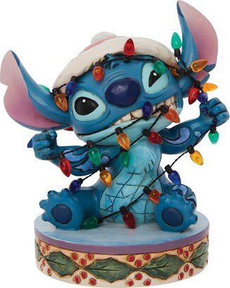 Jim Shore Stitch Wrapped in Christmas Figurine