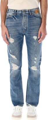 Distressed Slim-Cut Demin Jeans