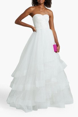 Strapless lace-paneled tiered tulle bridal gown