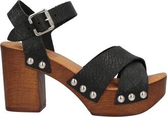 ROBERTO SERPENTINI Mules & Clogs Black