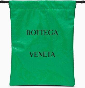 Green patent leather bag with logo