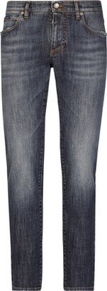 Slim fit washed stretch jeans with subtle abrasions