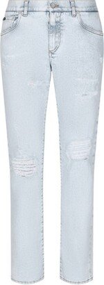 Stone-bleached slim-fit stretch jeans with rips