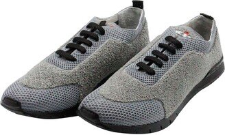 Sneaker Shoe Made Of Knit Fabric. The Bottom, With A Black Sole, Is Flexible And Extra Light; The Elastic Tongue Ensures Greater Comfort. Logo