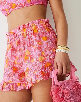 Cotton voile ruffle beach short in pink limone print