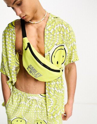 Smiley Collab fanny pack with foil love slogan in yellow