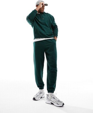 tracksuit with oversized hoodie and sweatpants in dark green