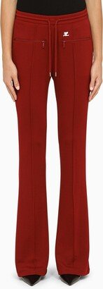 Red flared jogging trousers