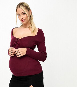 ASOS DESIGN Maternity knitted top with sweetheart neck and lace up front detail in dark red