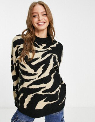 oversized jacquard sweater in beige and black zebra