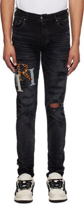 Black Staggered Jeans