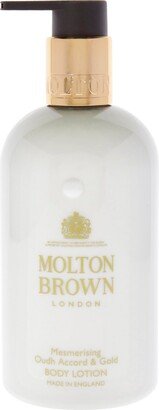 Mesmerising Oudh Accord and Gold by for Unisex - 10 oz Body Lotion