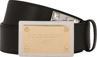 Calfskin belt with chain and branded tag