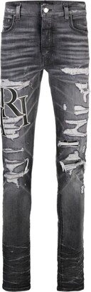 Logo-Print Ripped Skinny Jeans