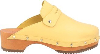 ENNEQUADRO Mules & Clogs Yellow