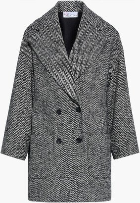 Double-breasted herringbone tweed coat